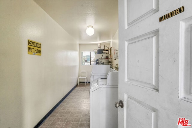 laundry room with washer and dryer