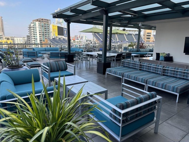 view of patio / terrace featuring an outdoor hangout area and a pergola