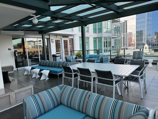 view of patio featuring an outdoor hangout area and a pergola