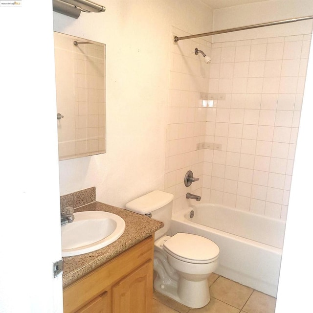 full bathroom with toilet, vanity,  shower combination, and tile patterned flooring