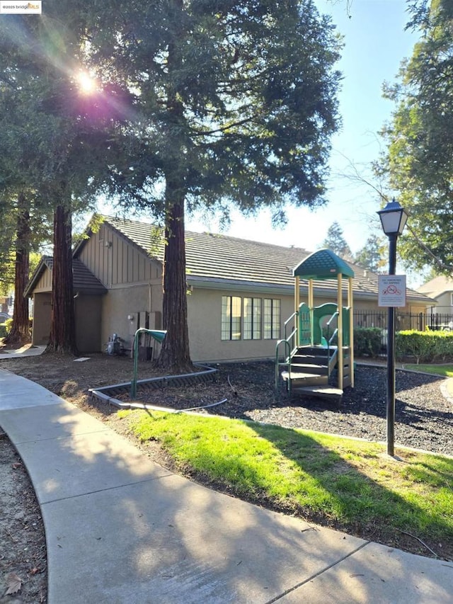 view of front facade featuring a playground