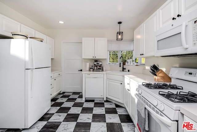 kitchen with white cabinetry, sink, white appliances, and pendant lighting