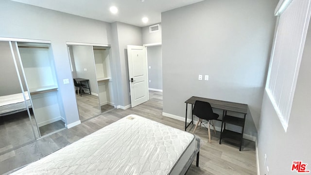 bedroom featuring light hardwood / wood-style floors