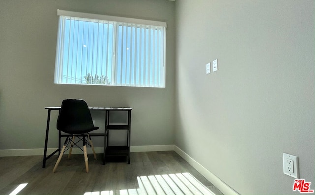 office space with hardwood / wood-style floors