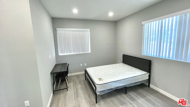 bedroom featuring light hardwood / wood-style flooring