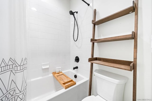 bathroom with toilet and shower / tub combo