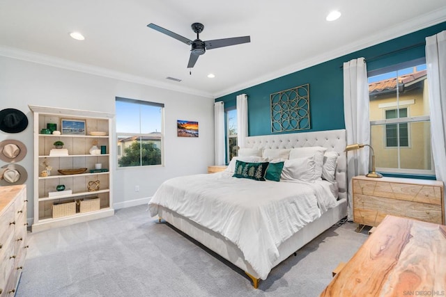 bedroom with light carpet, ceiling fan, and ornamental molding