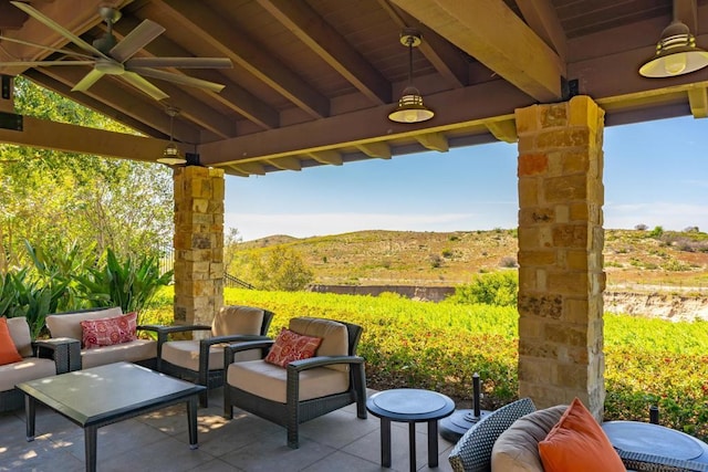 view of patio / terrace featuring ceiling fan and an outdoor hangout area