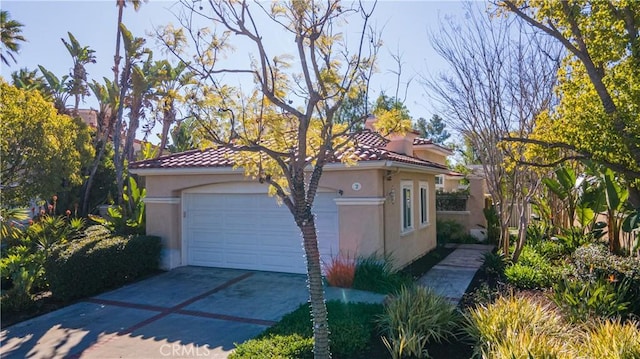 view of side of home featuring a garage