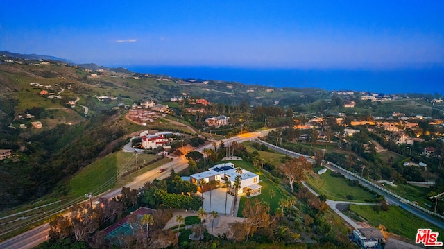 view of aerial view at dusk