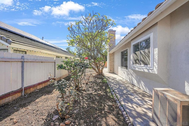 view of yard featuring central AC