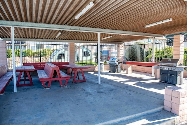 view of patio with a grill