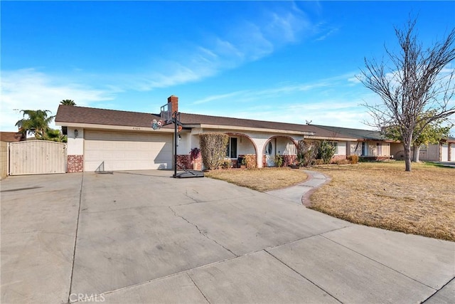 single story home featuring a garage