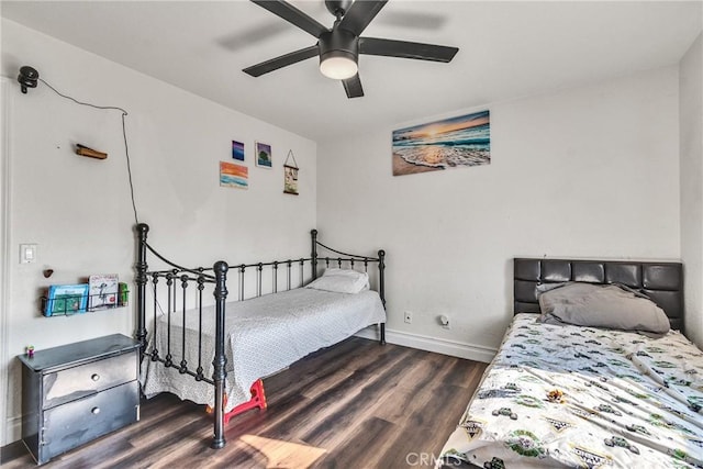 bedroom featuring ceiling fan and dark wood-type flooring