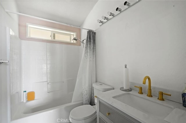 full bathroom featuring toilet, vanity, and shower / bath combination with curtain