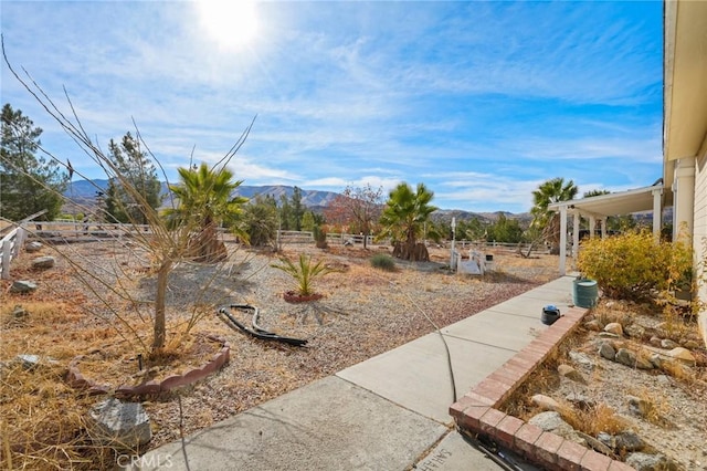 view of yard with a mountain view