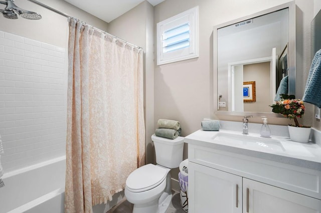 full bathroom with toilet, vanity, and shower / tub combo with curtain