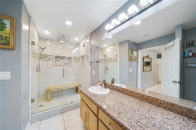 bathroom with recessed lighting, tile patterned floors, visible vents, vanity, and a stall shower