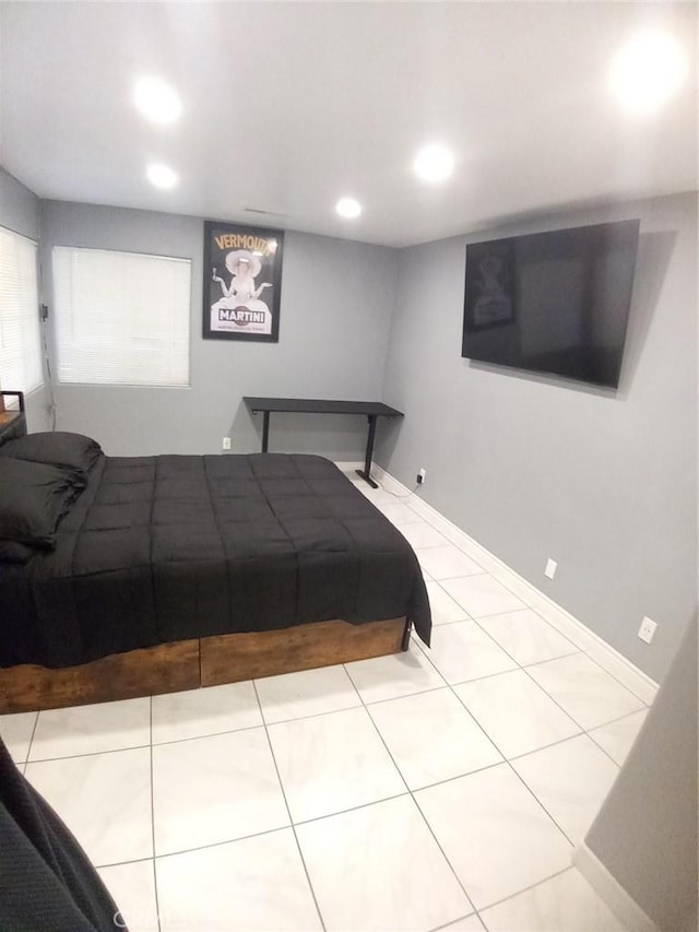 bedroom featuring recessed lighting and tile patterned flooring