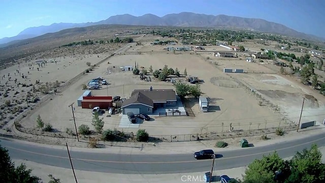 drone / aerial view featuring a mountain view