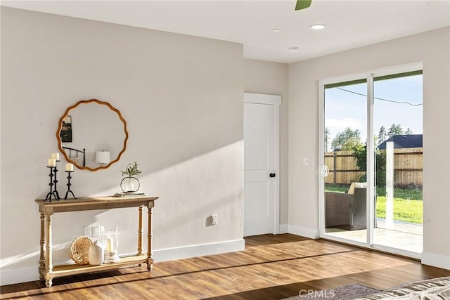 doorway to outside featuring hardwood / wood-style flooring