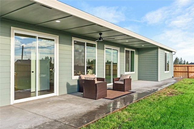 view of patio / terrace featuring ceiling fan