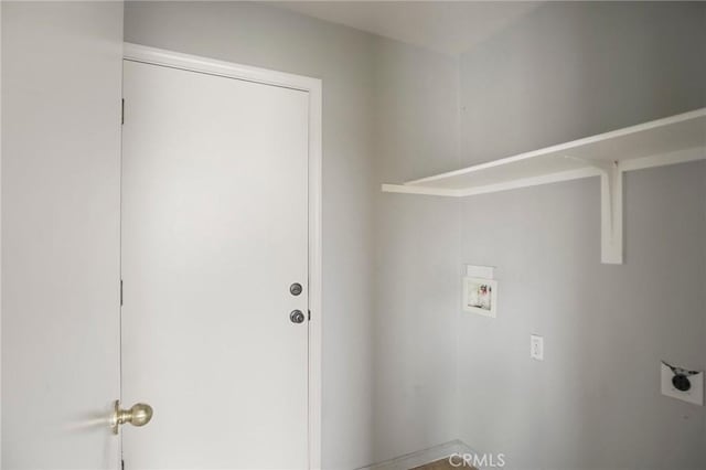 laundry room featuring washer hookup and electric dryer hookup