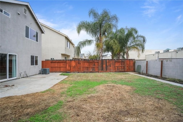 view of yard featuring a patio area and cooling unit