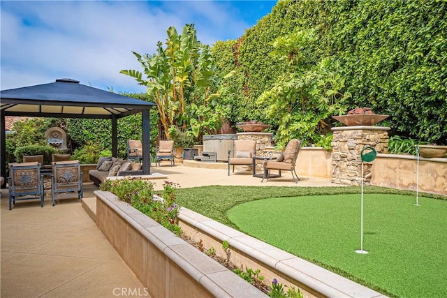 view of home's community with a gazebo and a patio