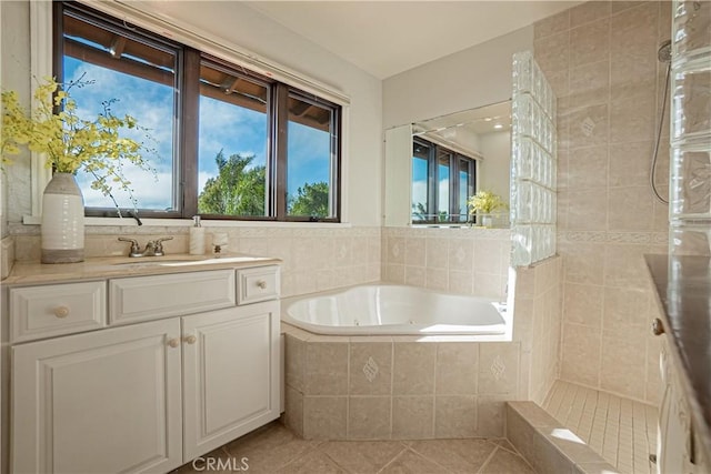 bathroom with vanity, separate shower and tub, and tile patterned flooring