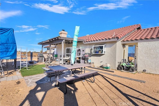 rear view of property with a patio