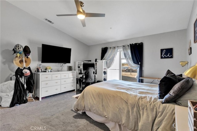 bedroom featuring ceiling fan, vaulted ceiling, and carpet floors