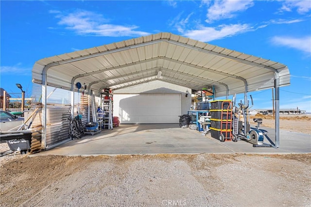 view of parking featuring a carport and a garage