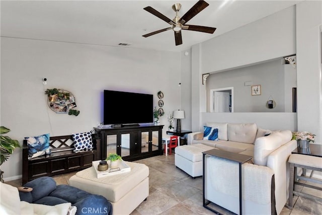 living room featuring ceiling fan