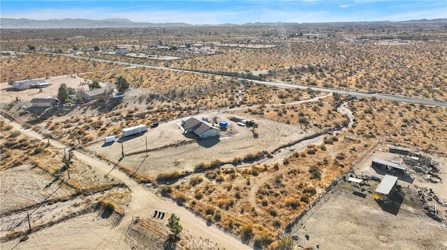 drone / aerial view featuring a mountain view