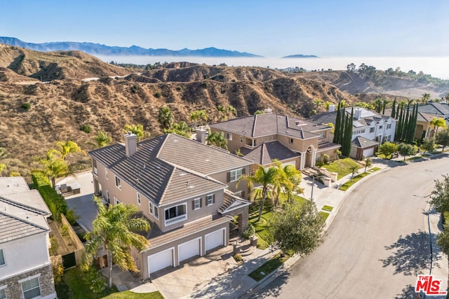 bird's eye view with a mountain view