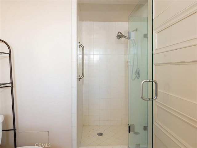 bathroom featuring an enclosed shower