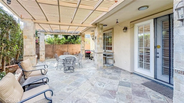 view of patio featuring a pergola