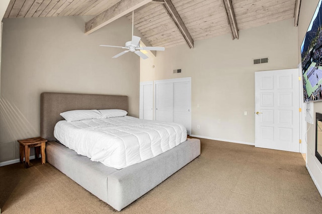 carpeted bedroom featuring ceiling fan, wooden ceiling, high vaulted ceiling, and beam ceiling