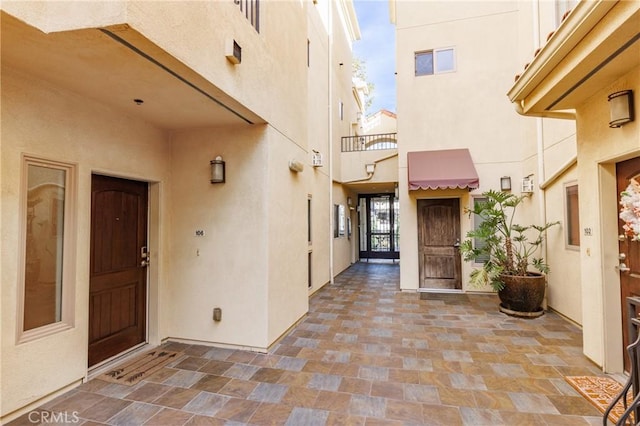 doorway to property with a balcony