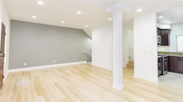 unfurnished living room featuring light hardwood / wood-style flooring