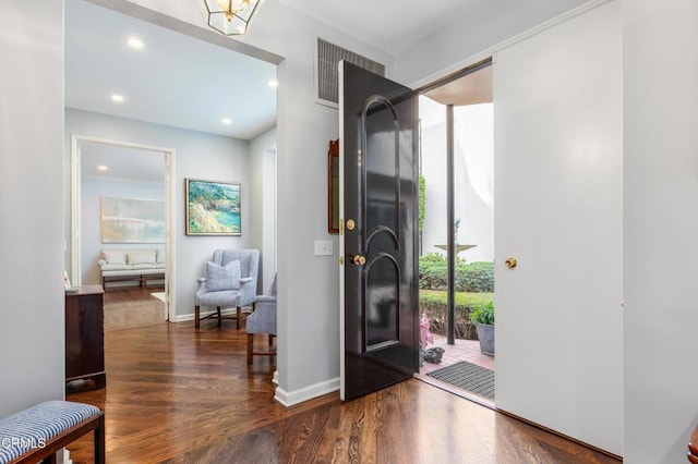 foyer featuring dark wood-type flooring