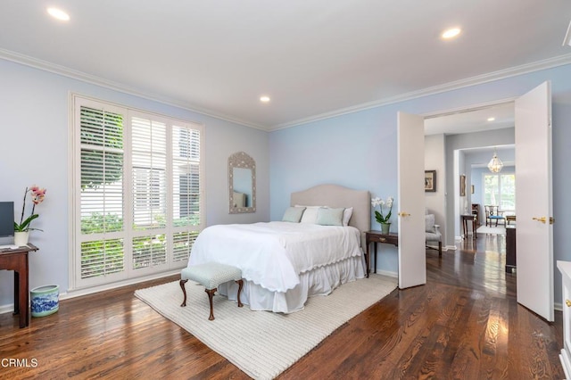 bedroom with dark wood-type flooring and crown molding