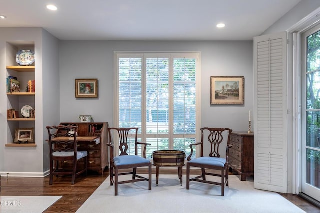 living area featuring dark hardwood / wood-style floors