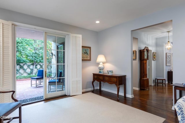 doorway featuring dark hardwood / wood-style floors