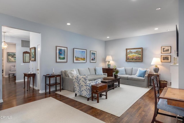 living room featuring dark hardwood / wood-style floors