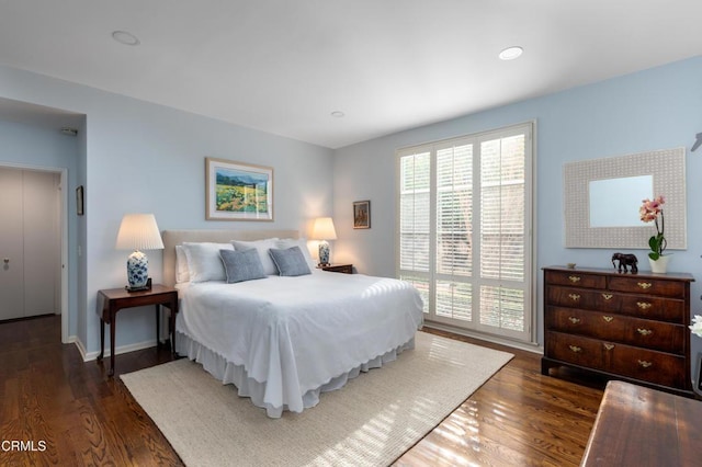 bedroom featuring dark hardwood / wood-style floors