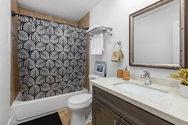 full bathroom with toilet, shower / bathtub combination with curtain, and vanity