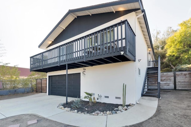 view of property exterior featuring a garage