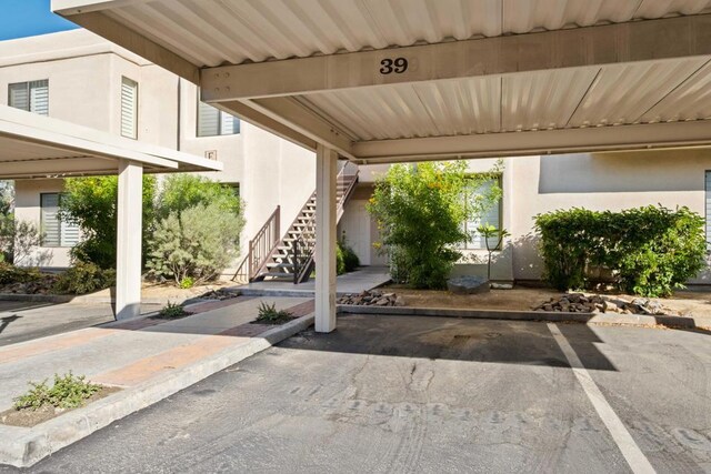 view of patio / terrace featuring a carport